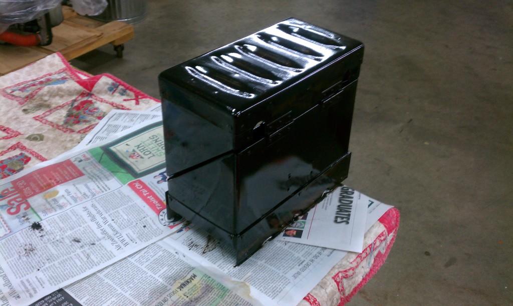 Helper Greg hand painted the battery box with acid proof paint. Needs 3 coats. Stinks and dries very slowly....