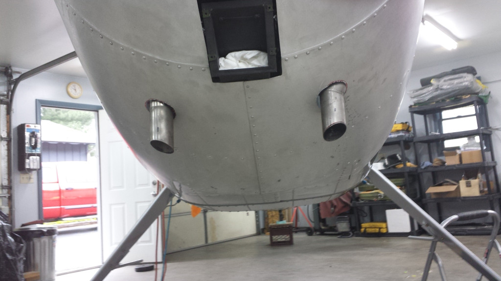 Then just fearlessly cut holes in your 68 year old, unobtanium lower cowling! It actually went well.