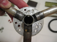 Yoke hub showing yoke curved tube and short vertical tube at the bottom.