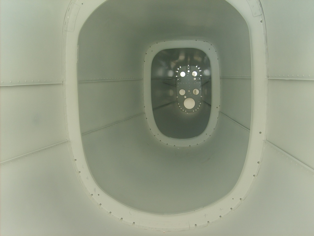 Belly Skin and Tailcone after riveting and priming.JPG