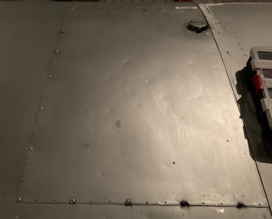 Left wing tank cover.jpg